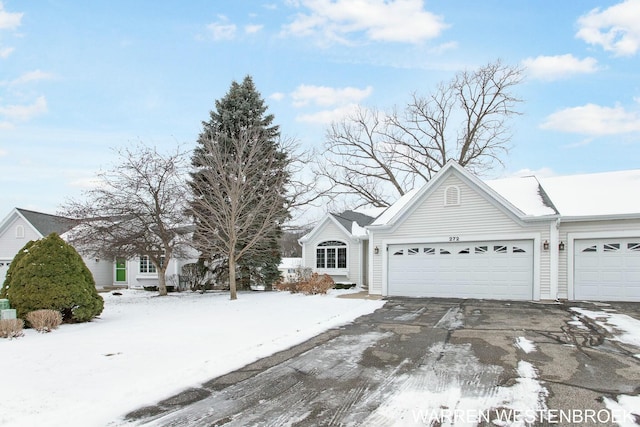 single story home with a garage