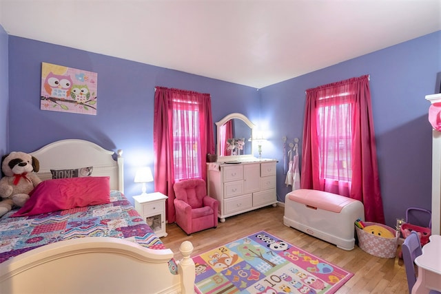 bedroom featuring light wood-type flooring