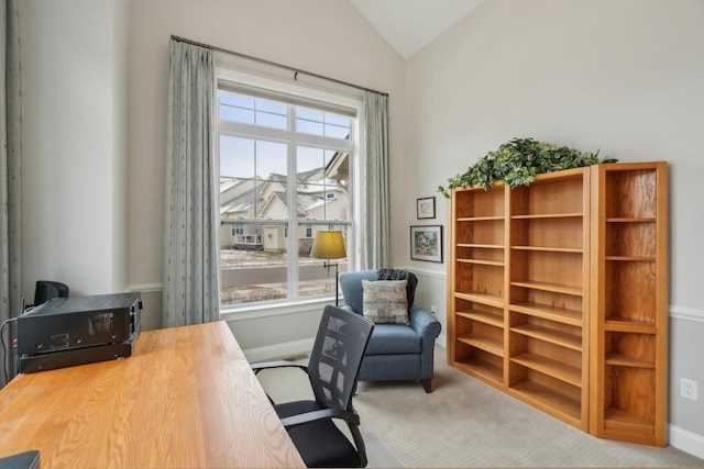 office area featuring carpet floors and lofted ceiling