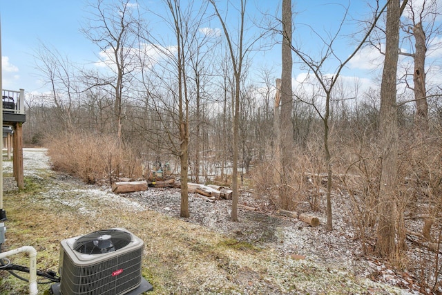 view of yard with central AC