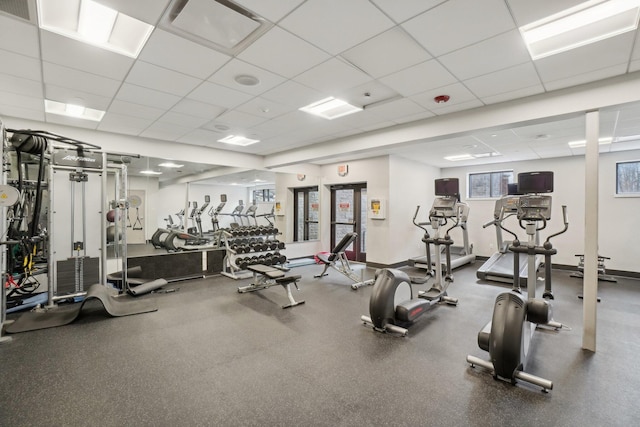 workout area with a drop ceiling