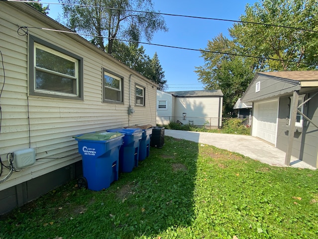 view of yard featuring a garage