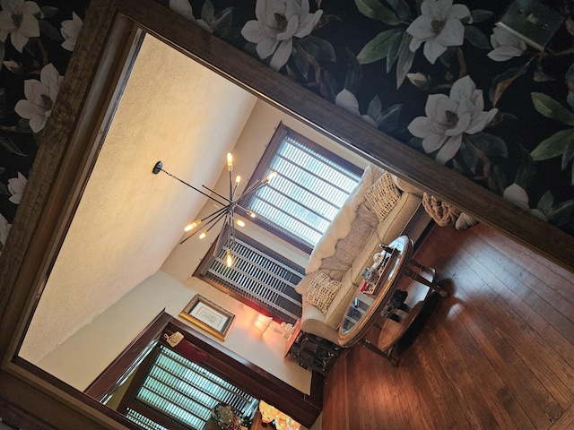 living room with a notable chandelier