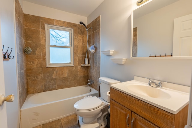 full bathroom with toilet, tile patterned flooring, tiled shower / bath combo, and vanity