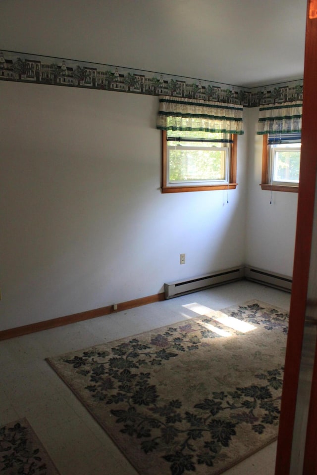 spare room featuring a baseboard radiator