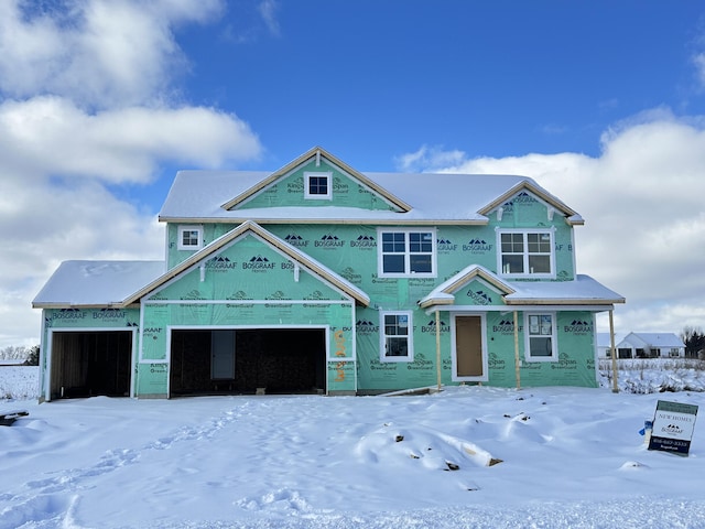 property in mid-construction featuring a garage