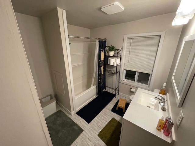 bathroom with vanity and shower / bath combo