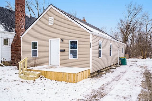 view of snow covered property