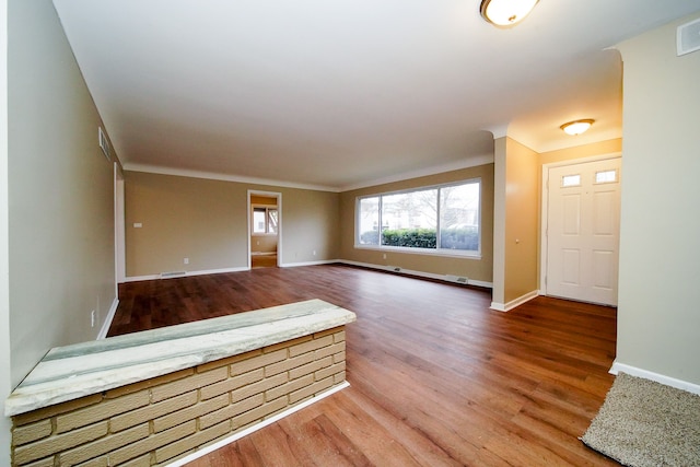 spare room featuring hardwood / wood-style flooring