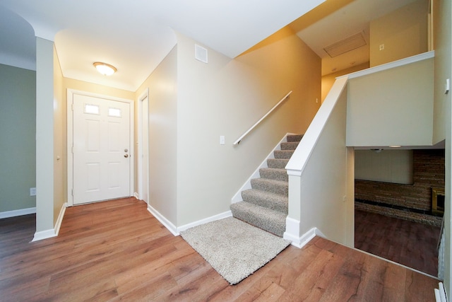 foyer with light hardwood / wood-style flooring