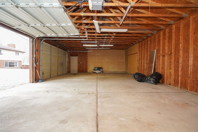 garage featuring a garage door opener