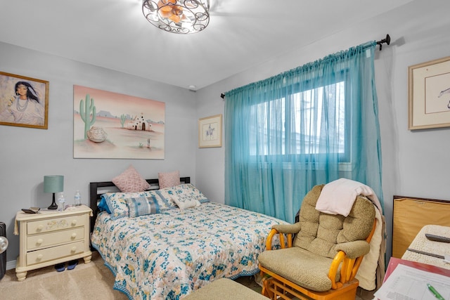 bedroom with light colored carpet