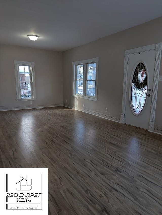 foyer entrance featuring dark hardwood / wood-style floors