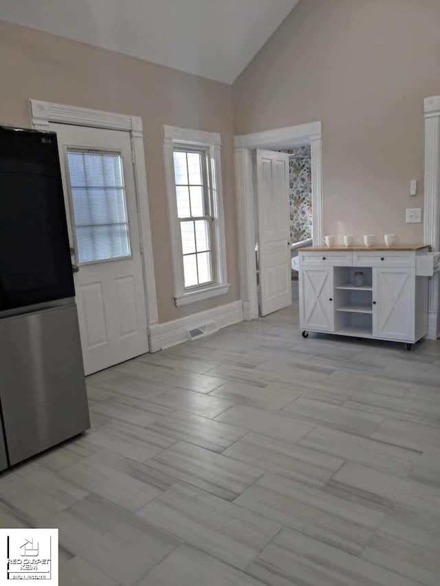 interior space with vaulted ceiling