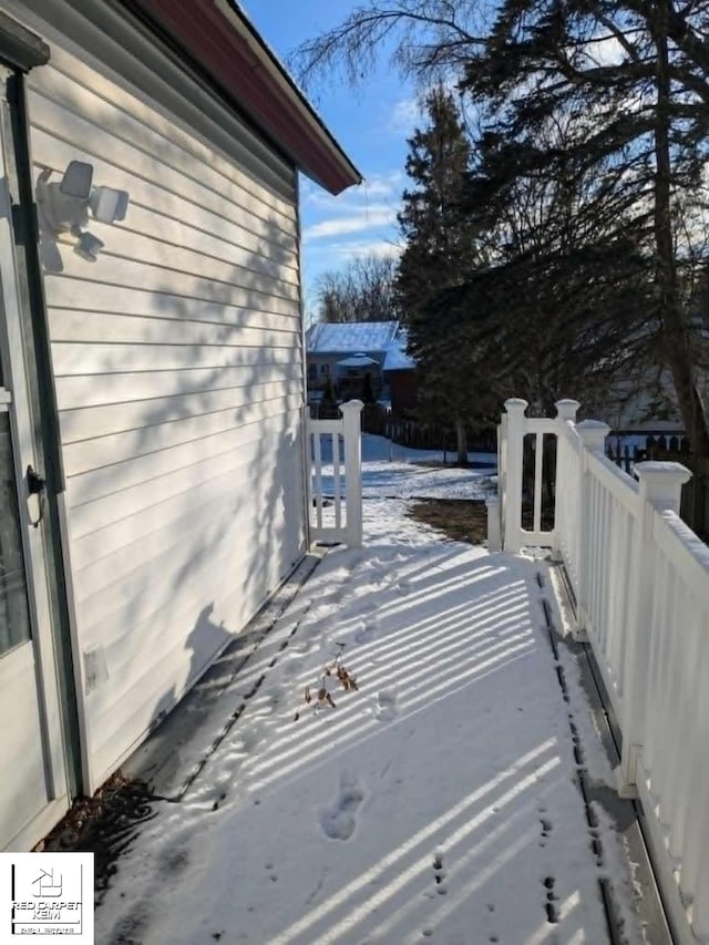 view of snow covered property