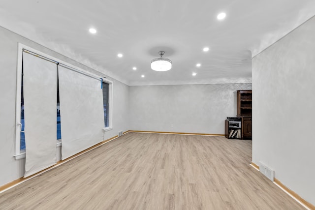 unfurnished room featuring light wood-type flooring