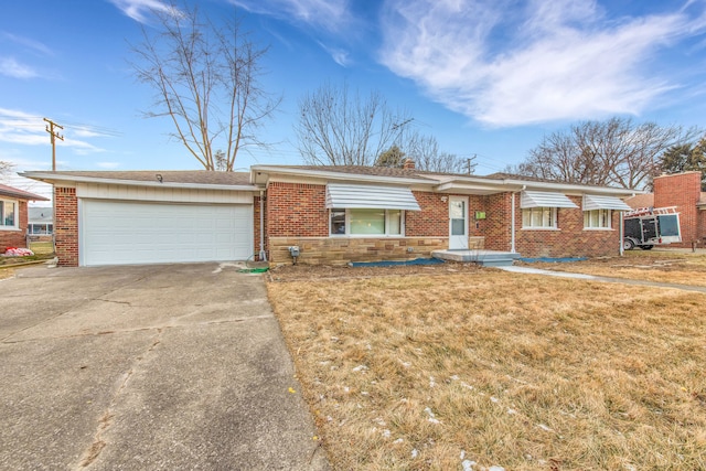 single story home featuring a front yard and a garage