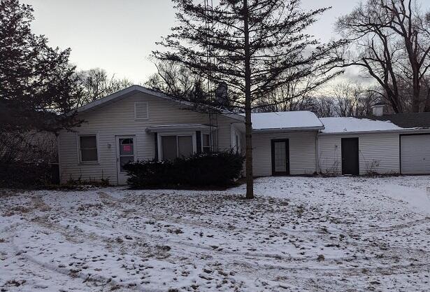 ranch-style house with a garage