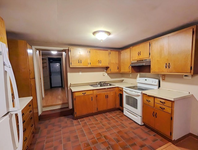 kitchen featuring sink and white appliances