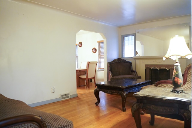 sitting room with light hardwood / wood-style flooring