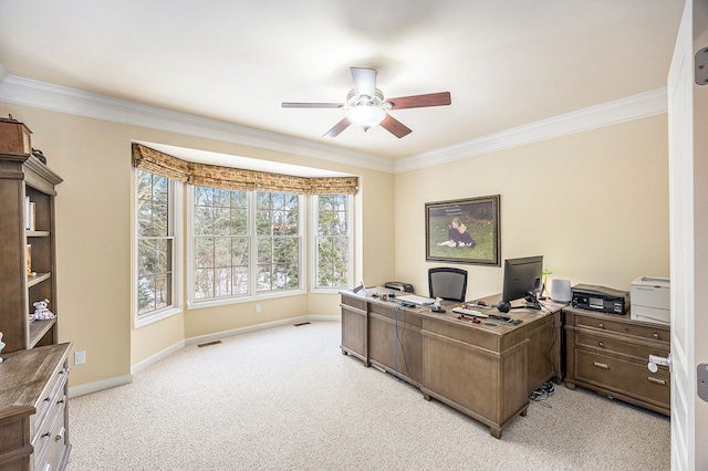 office area featuring light colored carpet, ceiling fan, and crown molding