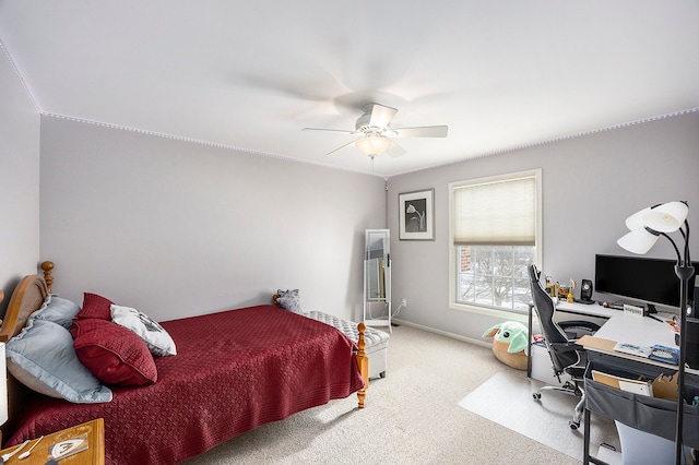 bedroom featuring ceiling fan and carpet floors