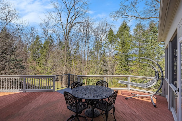 deck featuring outdoor dining space