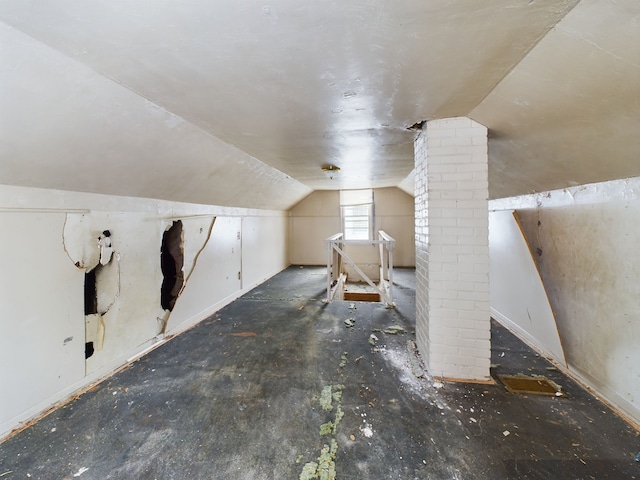 bonus room featuring vaulted ceiling