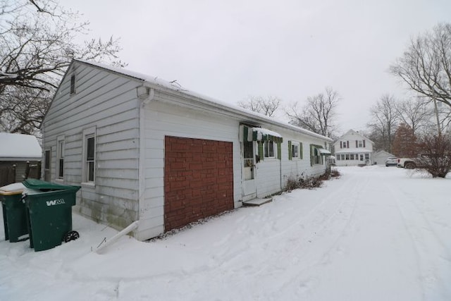 view of snow covered property