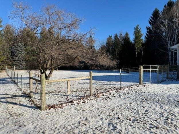 view of pool featuring fence