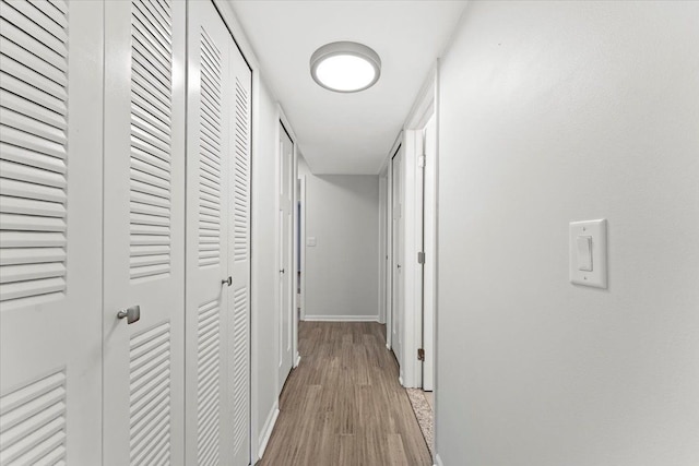 hall featuring light hardwood / wood-style floors