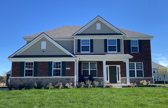 view of front of home with a front yard