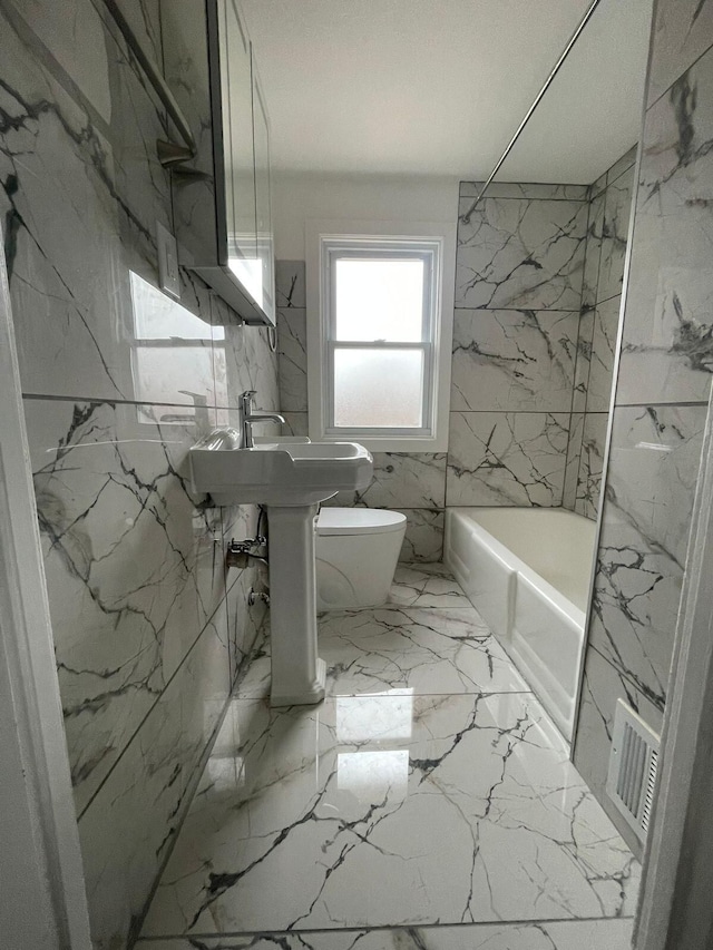 bathroom featuring toilet