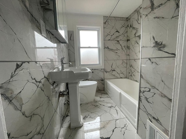 bathroom featuring toilet