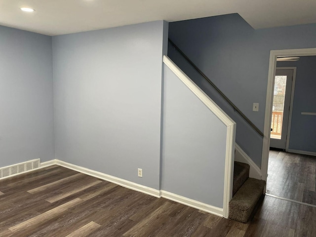 unfurnished room featuring hardwood / wood-style flooring