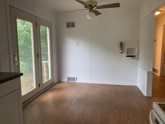 spare room with ceiling fan and hardwood / wood-style floors