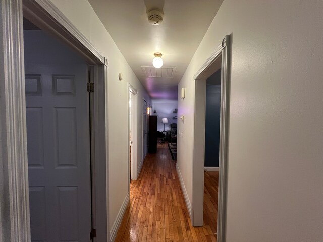 hall with light hardwood / wood-style floors