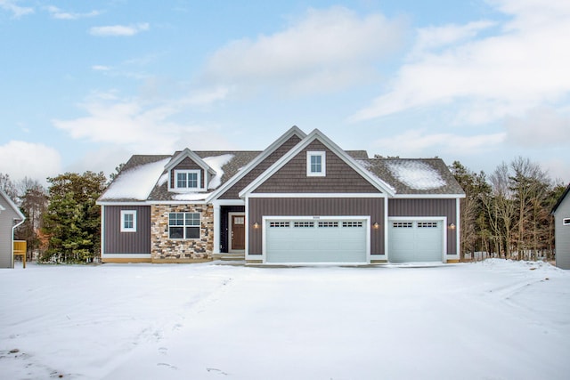 craftsman house with a garage