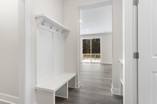 mudroom with dark hardwood / wood-style floors