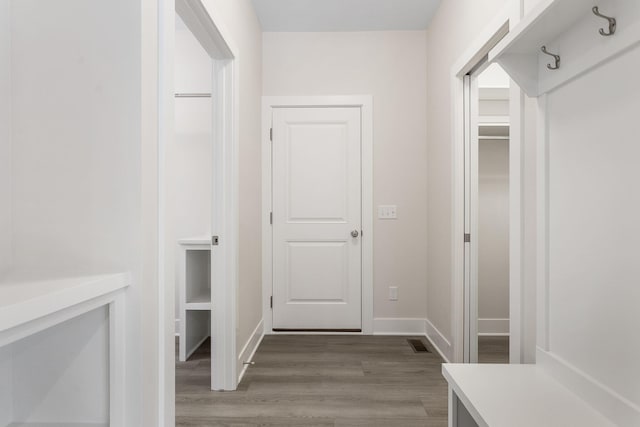 mudroom featuring wood-type flooring