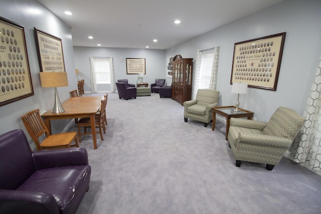 carpeted living room featuring a wealth of natural light