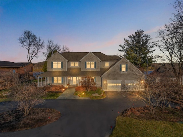 view of front of property with a garage