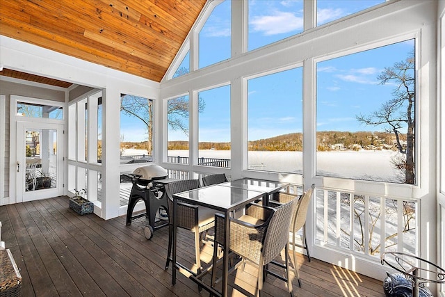 sunroom featuring wooden ceiling and vaulted ceiling