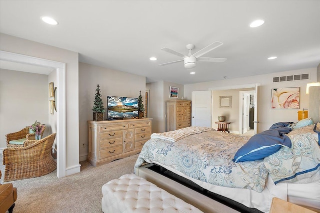 bedroom with ceiling fan and light colored carpet