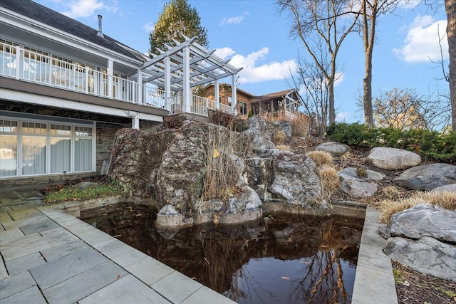 surrounding community featuring a pergola