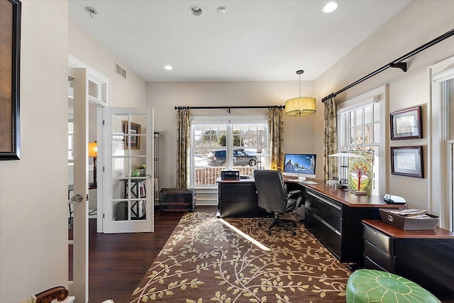 office with dark hardwood / wood-style flooring