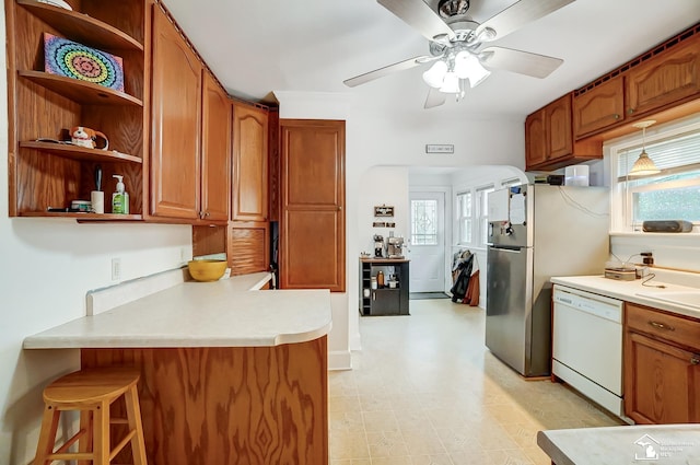 kitchen featuring dishwasher, fridge, kitchen peninsula, and ceiling fan