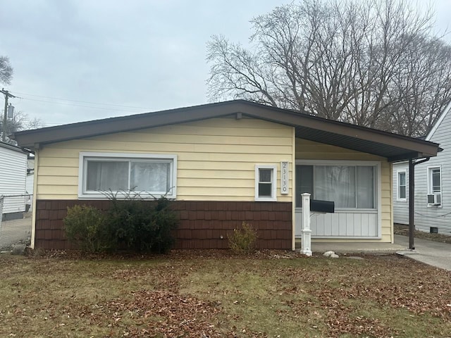 view of front of house featuring cooling unit