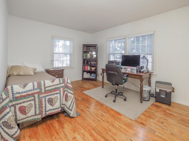 bedroom featuring hardwood / wood-style flooring