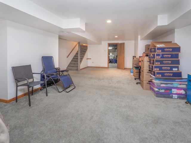 living area with light colored carpet